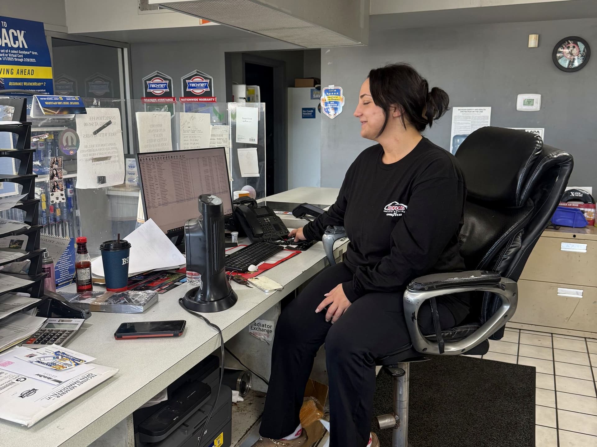 Service writer at the front desk of the Westland shop
